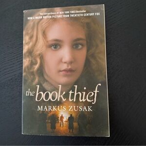 the book thief by Markus Zusak paperback. Preowned in great condition.